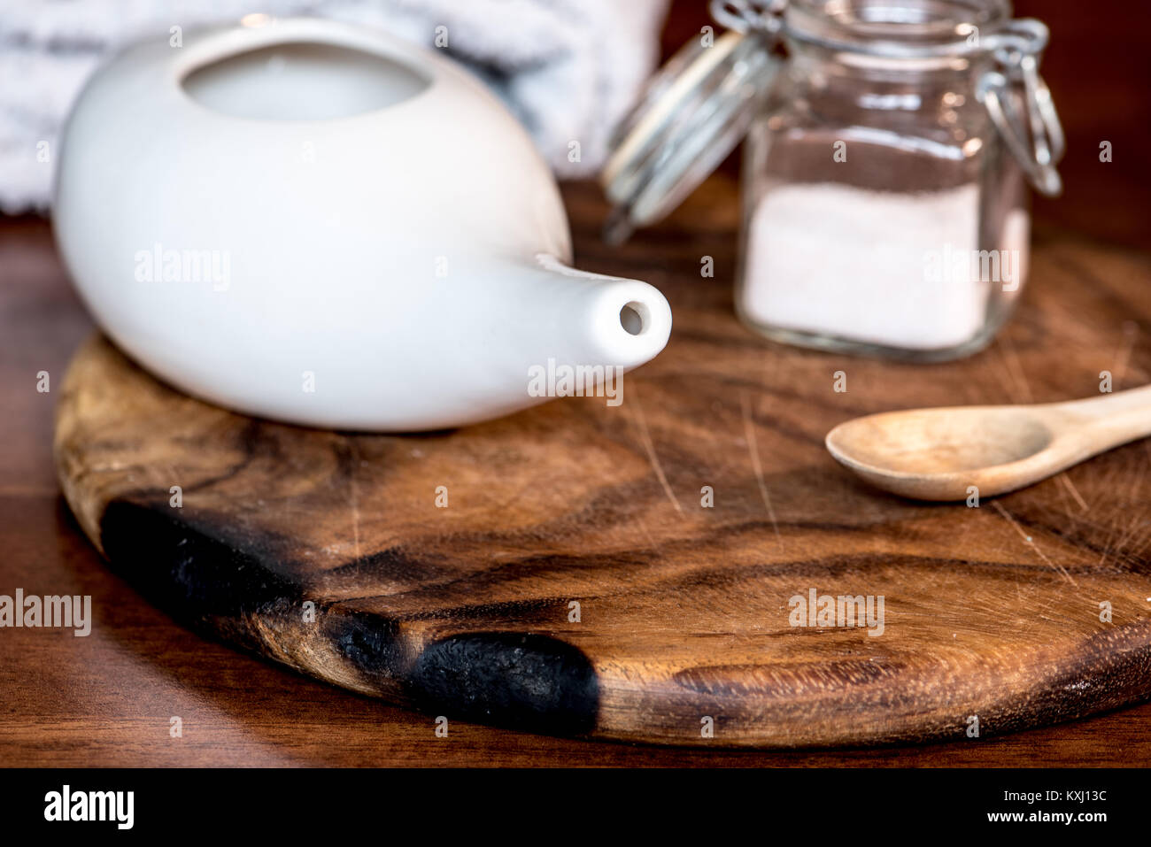 neti pot, ayurvedic tools for cleaning nose with water and salt, on a