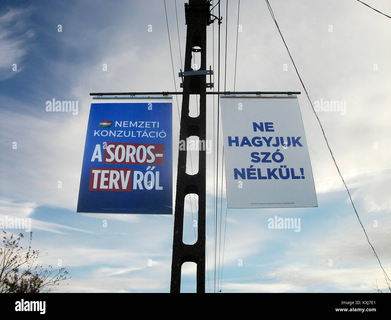 Billboards of national consultation on the Soros plan in Zichyújfalu, Fejér County, Hungary 3 Stock Photo
