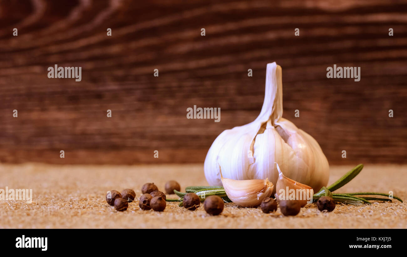 Garlic and cloves lying on a napkin. Healthy food and spices. Ad Stock ...