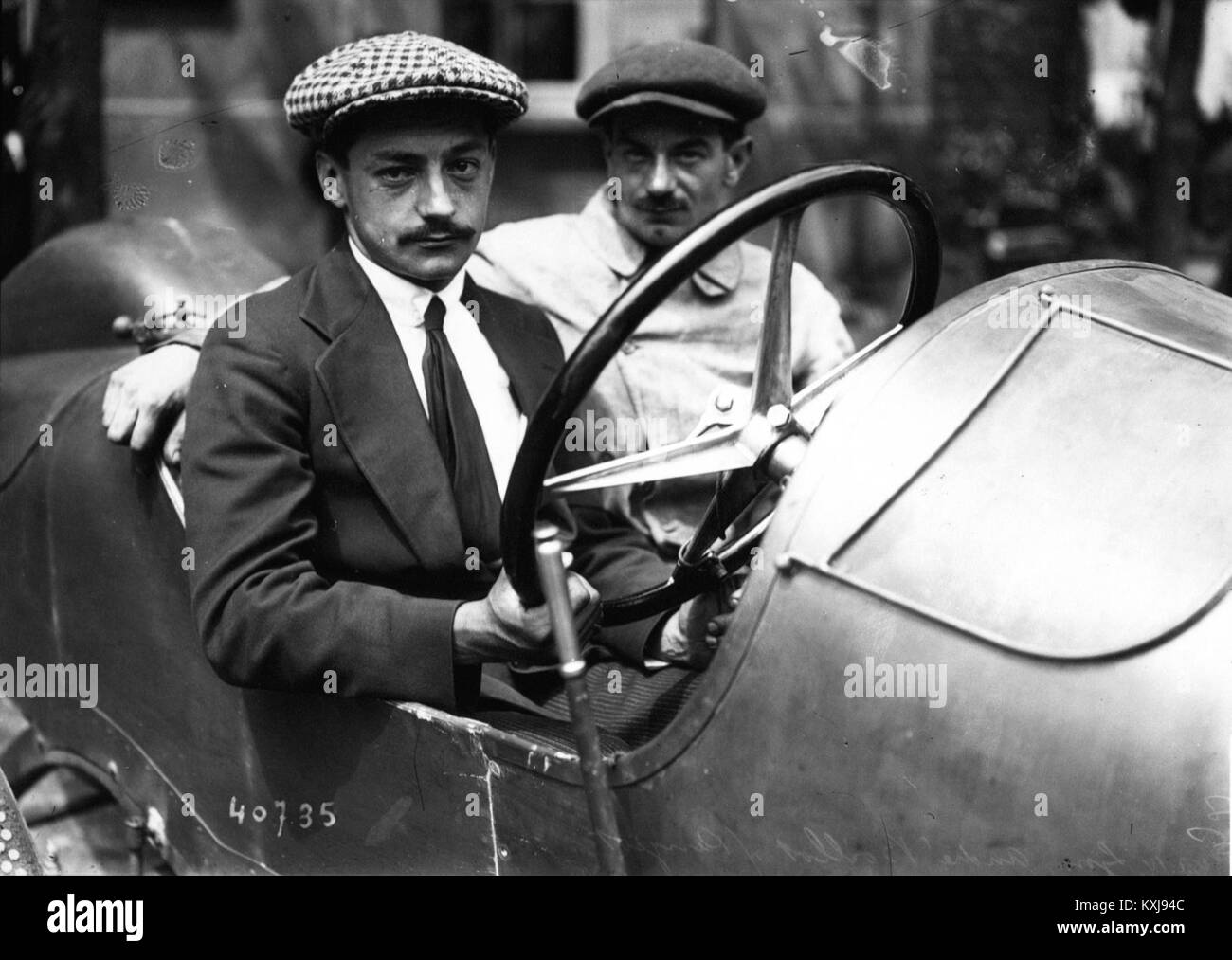 This photograph captures André Boillot, a French race car driver, at the 1914 French Grand Prix. The image shows Boillot during his participation in this early 20th-century motor race. Stock Photo