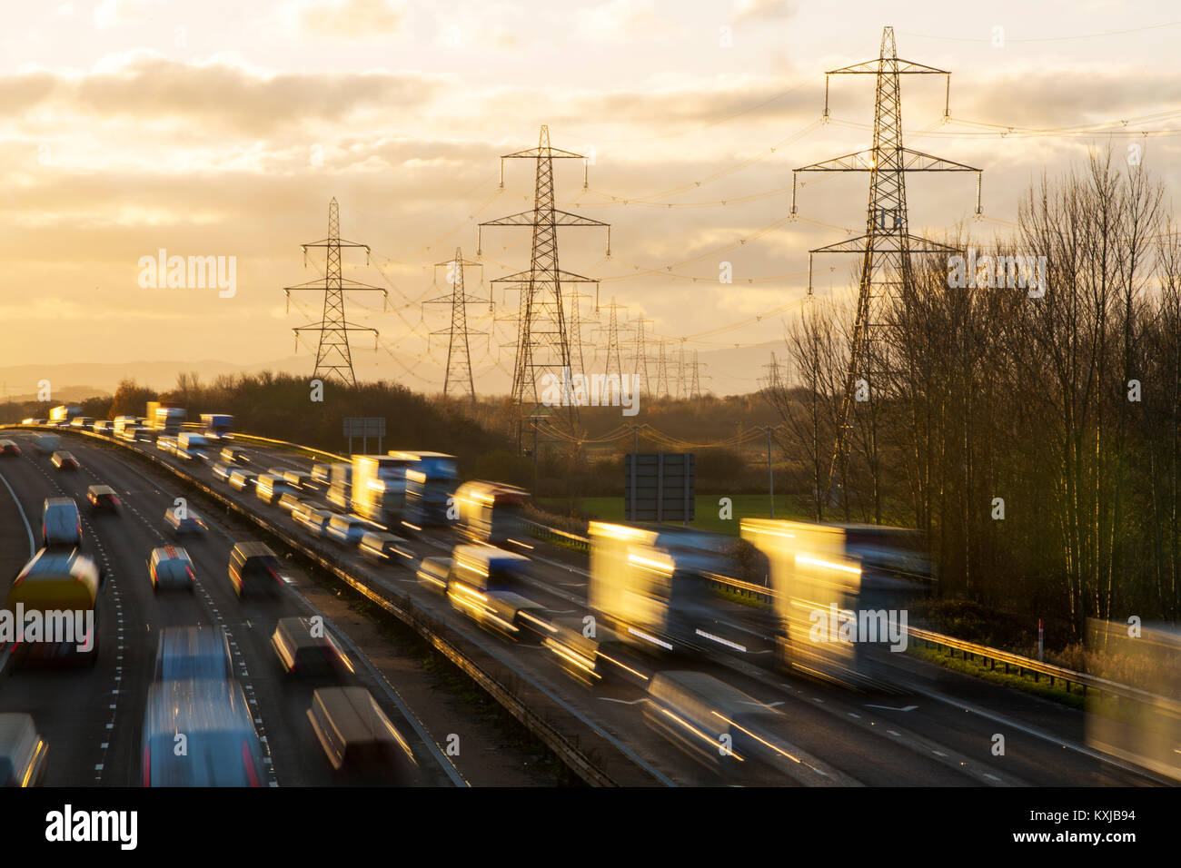 Rushhour on the M56 motorway near Helsby, Cheshire, UK at dusk. Stock Photo