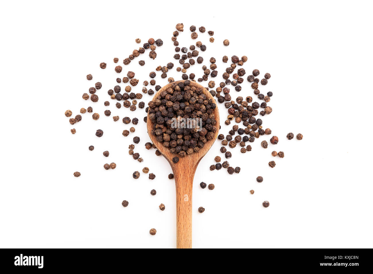 Black pepper seeds on white background Stock Photo Alamy