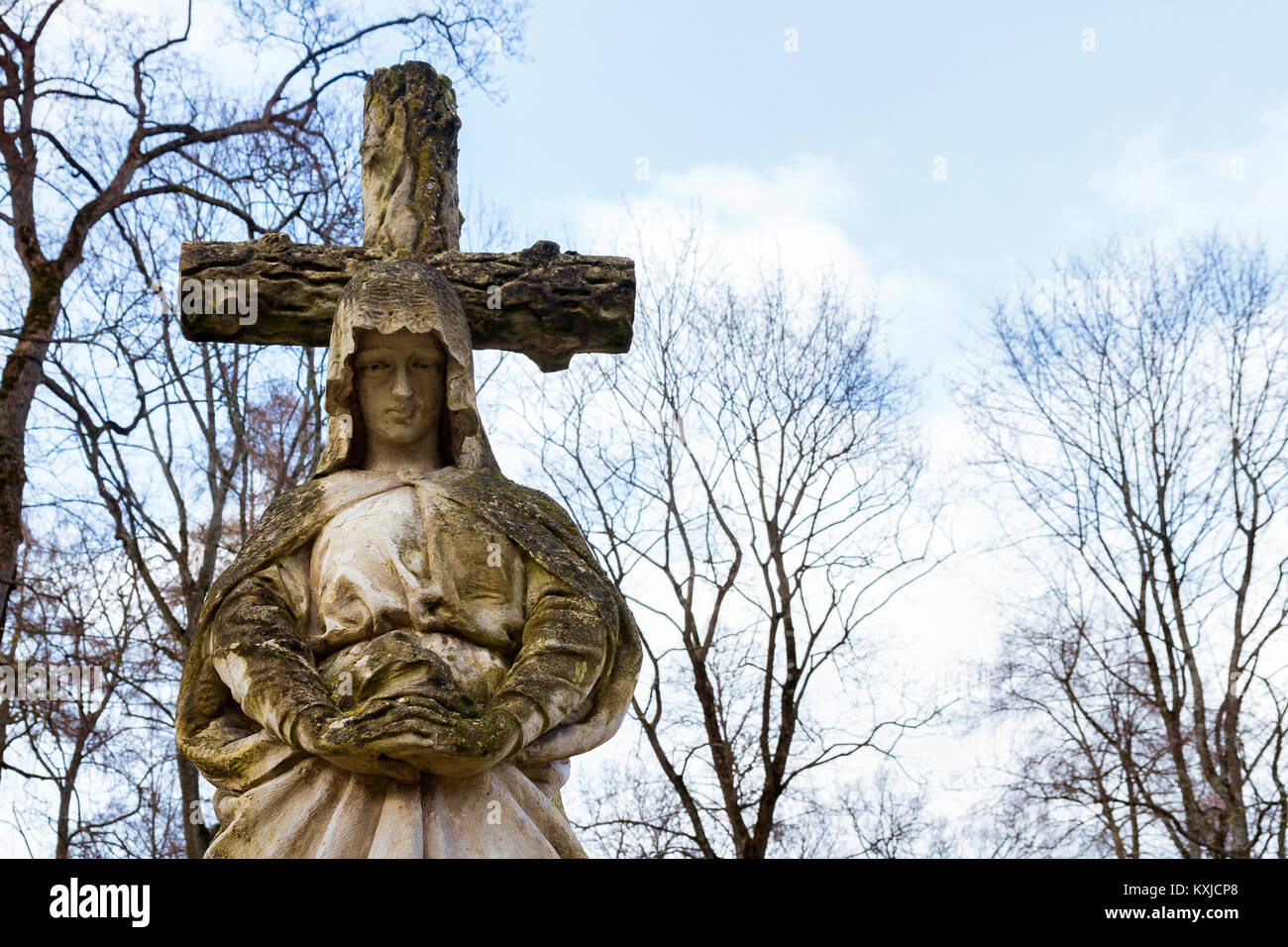 Ancient concrete statue of Virgin Mary at Rasos cemetery in Vilnius