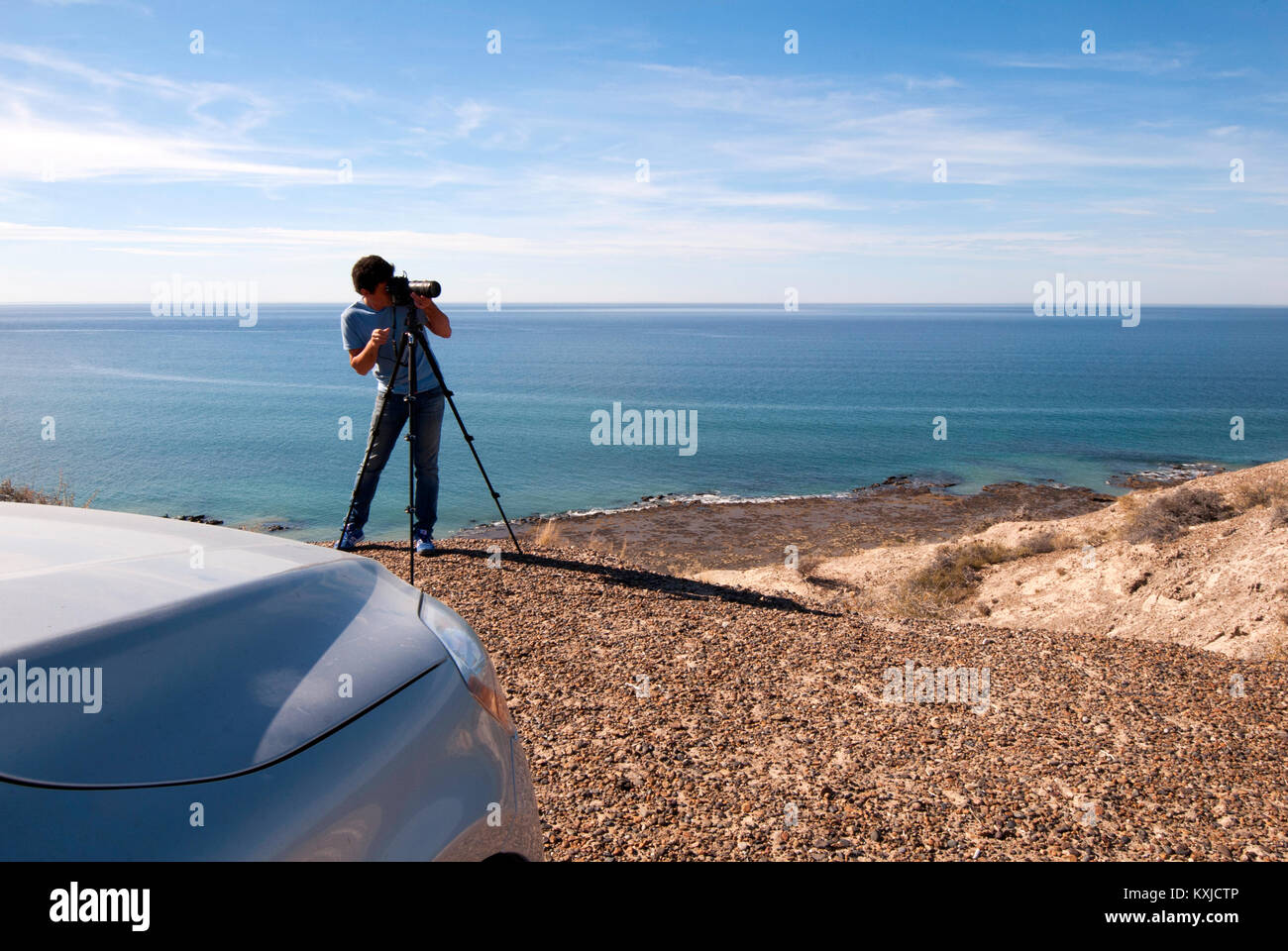 a photographer taking photos near Punta Ninfas, Peninsula Valdes, Puerto Madryn, Chubut, Argentina Stock Photo