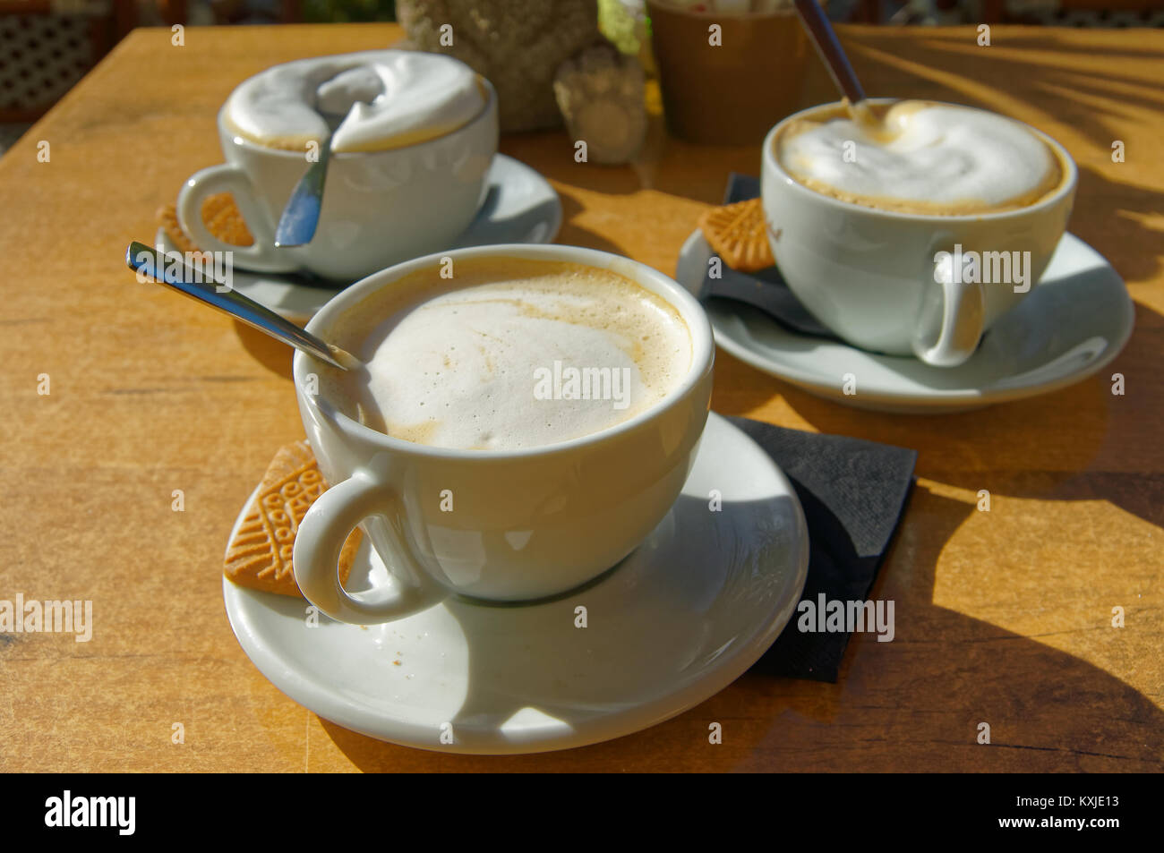 Three delicious italian Cappuccino on a table Stock Photo
