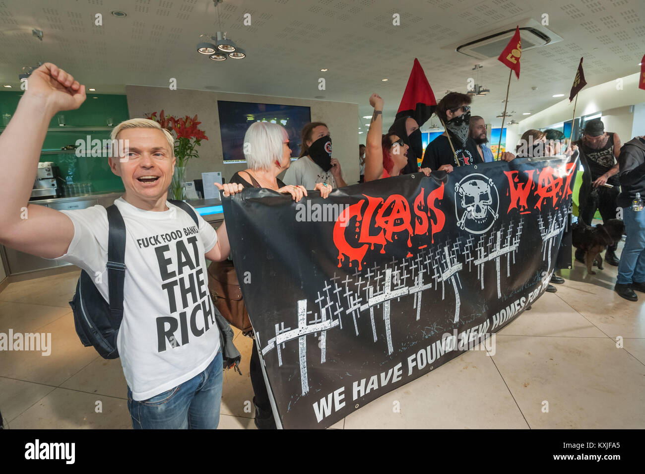 Class War display their banner, adapted from one of their old magazine ...