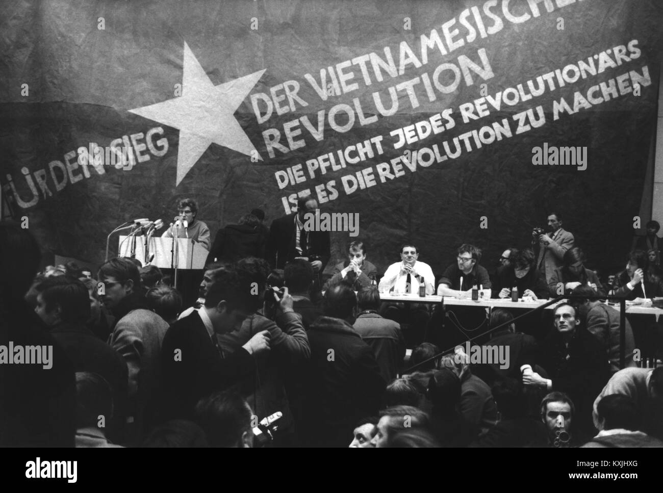 View of the speaker's podium at the 'International Vietnam Conference' in Berlin in the crowded auditorium of the Technische Universität during the opening session on February 17,1968. 3000 young people followed the invitation of the Socialist German Student Union (SDS) and numerous left-wing socialist youth organizations of western countries. The conference was opened by Karl-Dietrich Wolff, Federal President of the SDS. | usage worldwide Stock Photo