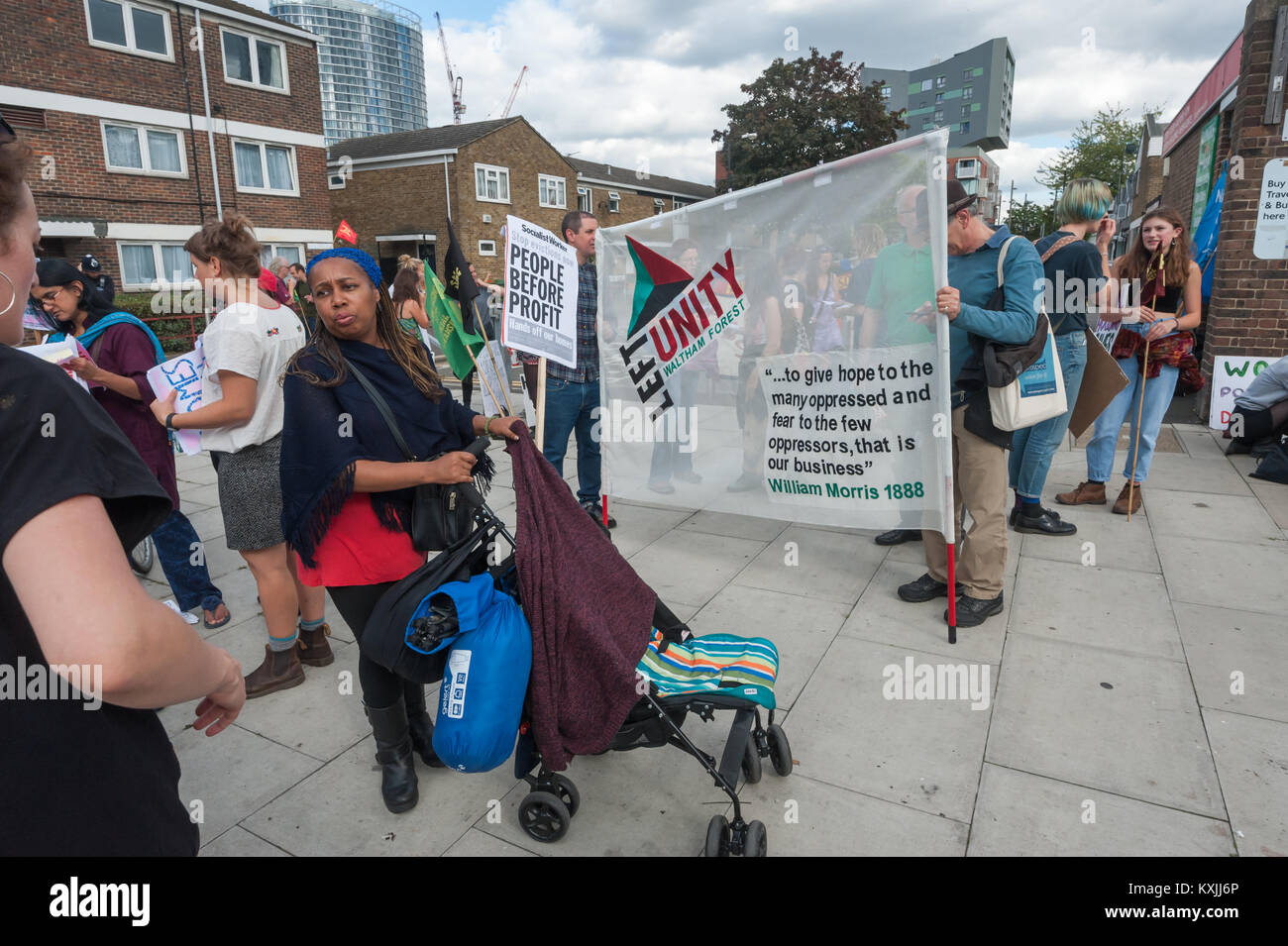 Left Unity's banner has a William Morris quote about giving 'hope to the many oppressed and fear to the few oppressors'. Stock Photo