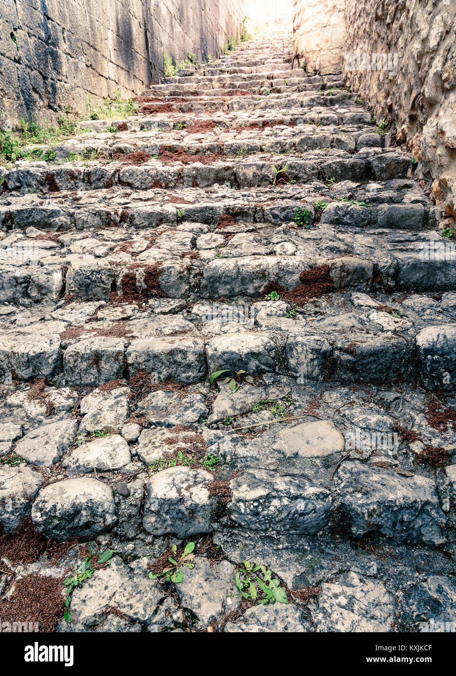 Medieval cobblestone street in a small Bosnian town of Pocitelj Stock Photo