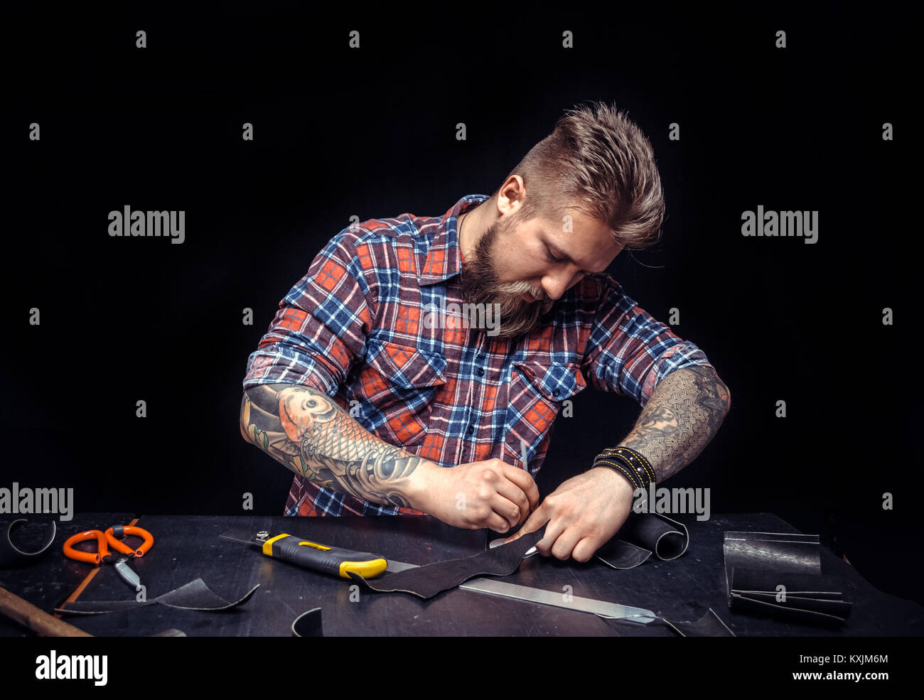 Master makes leather hi-res stock photography and images - Alamy