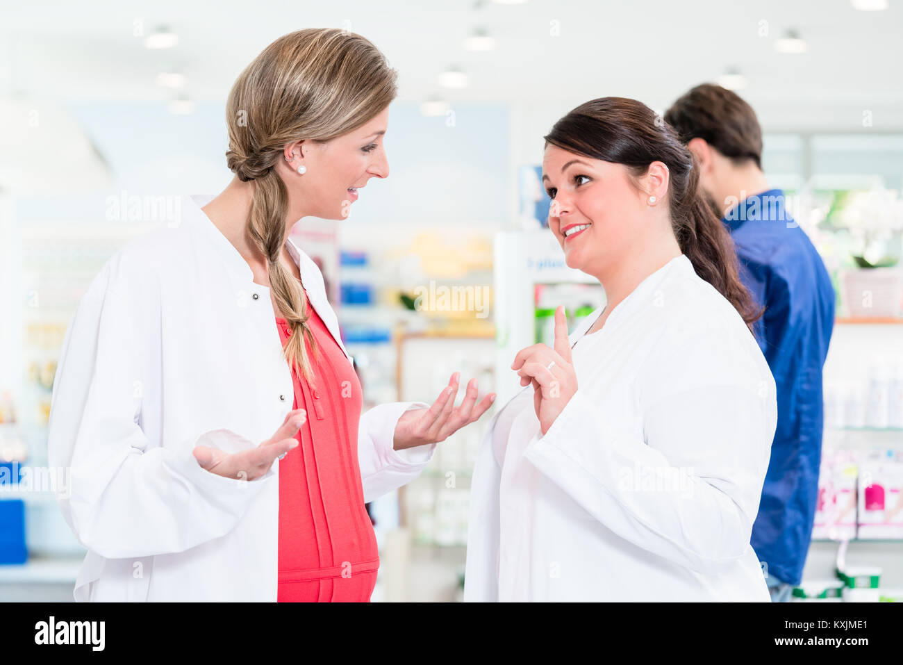 Pregnant pharmacist in protective employment ban  Stock Photo