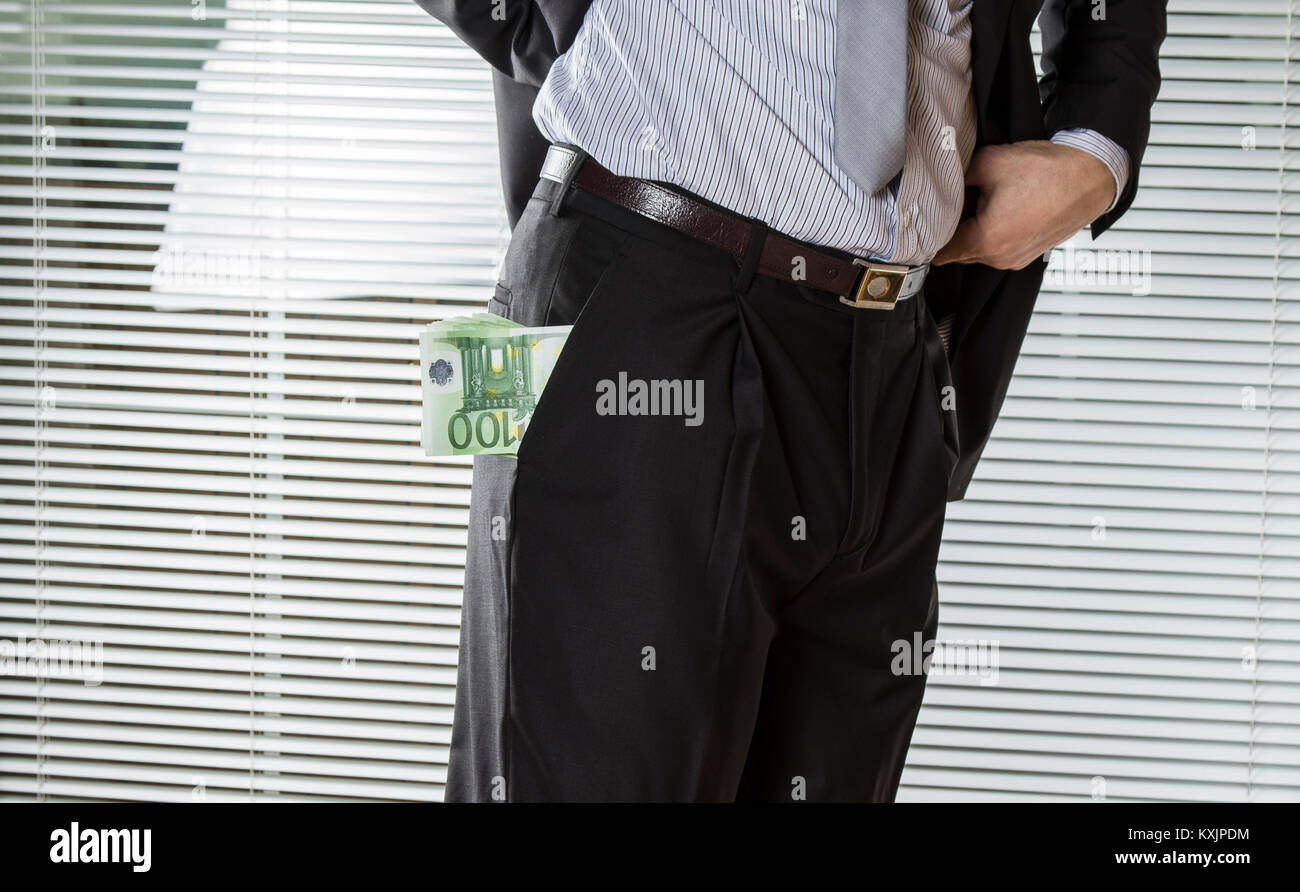 Successful businessman showing his cash money Stock Photo - Alamy