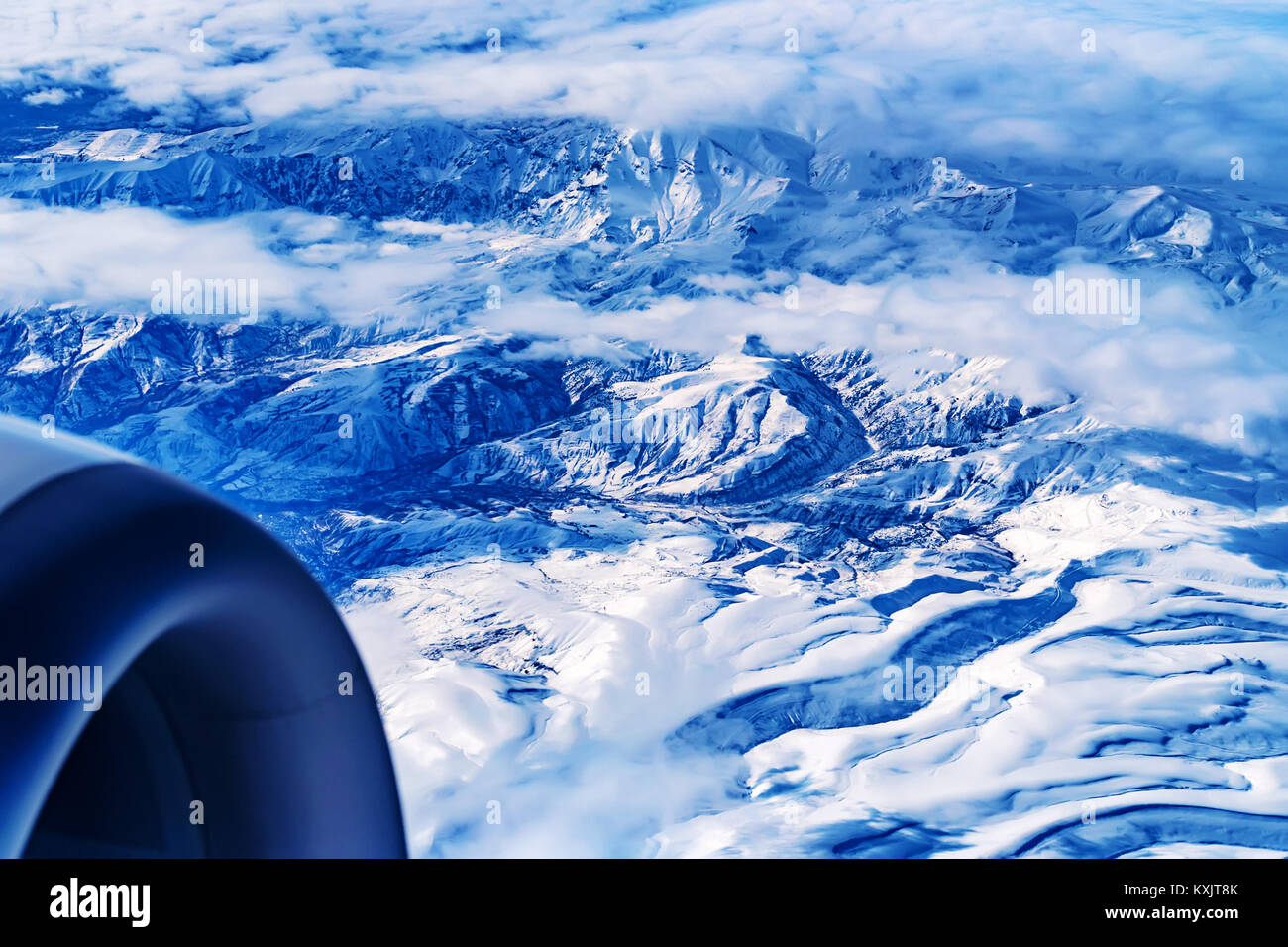 Aerial mountain view from aircraft Stock Photo - Alamy