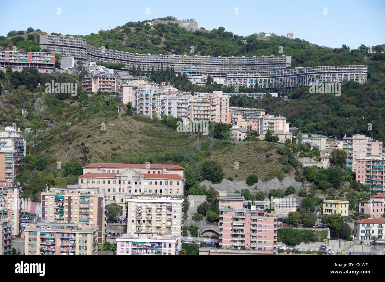 At the top of the images is Biscione, a huge social housing development on the edge of Genoa, viewed from Mura di San Bartolomeo Stock Photo