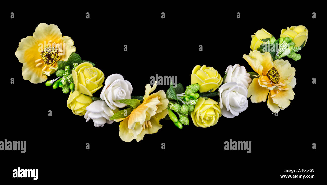 Yellow artificial flowers isolated on black background. Clipping path