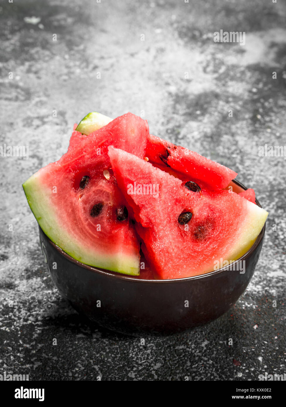 Pieces of fresh watermelon in a bowl. On a rustic background Stock ...