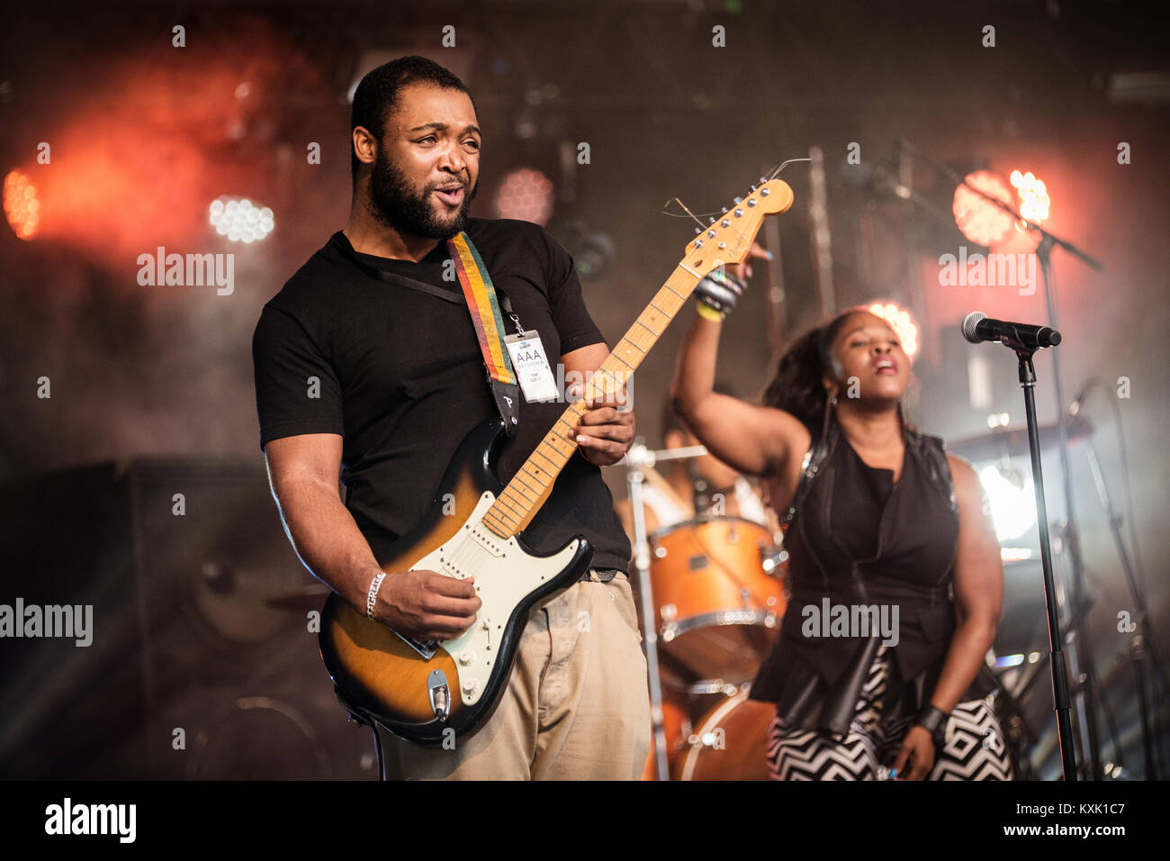 The American rap, soul and funk group The Coup originates from Oakland and is here pictured at a live concert at Vanguard Festival 2014 in Copenhagen. Here the band’s guitarist Grego Simmons is pictured live on stage. Denmark, 02/08 2014. Stock Photo