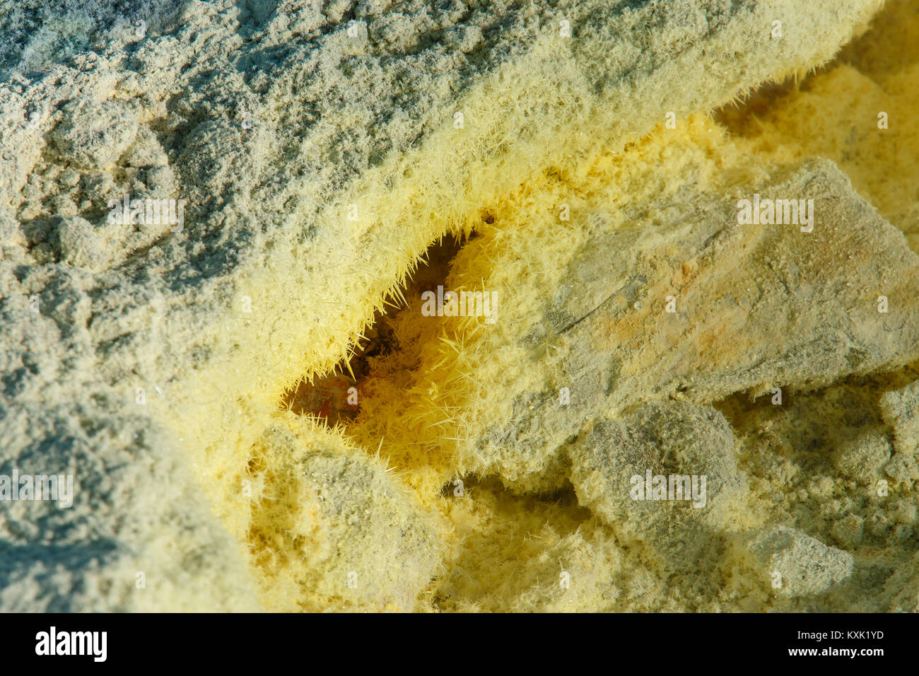 Fumarole sulfur crystal on Fossa volcano crater. Showing volcanic activity of sulphur smoke coming from the Grand Crater. Stock Photo