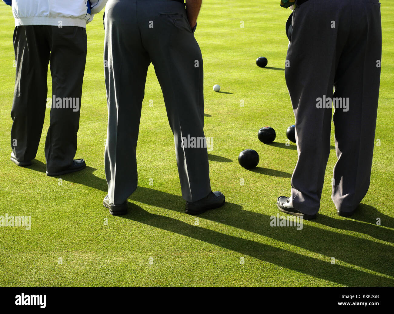 Bowlers studying the position of the bowls at one end, Perth Bowling Club, Perth, Scotland, UK Stock Photo