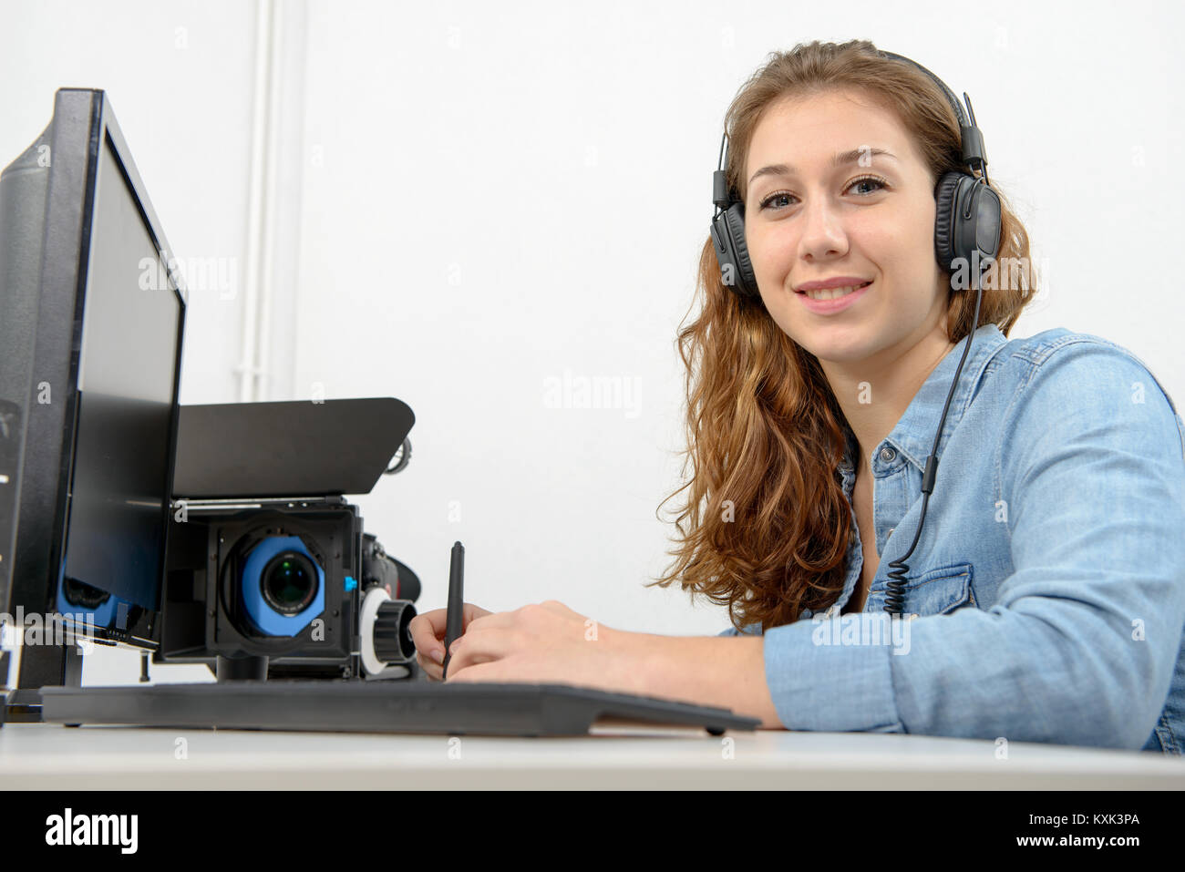 Actress Using Computer a young woman using computer for video editing Stock Photo - Alamy
