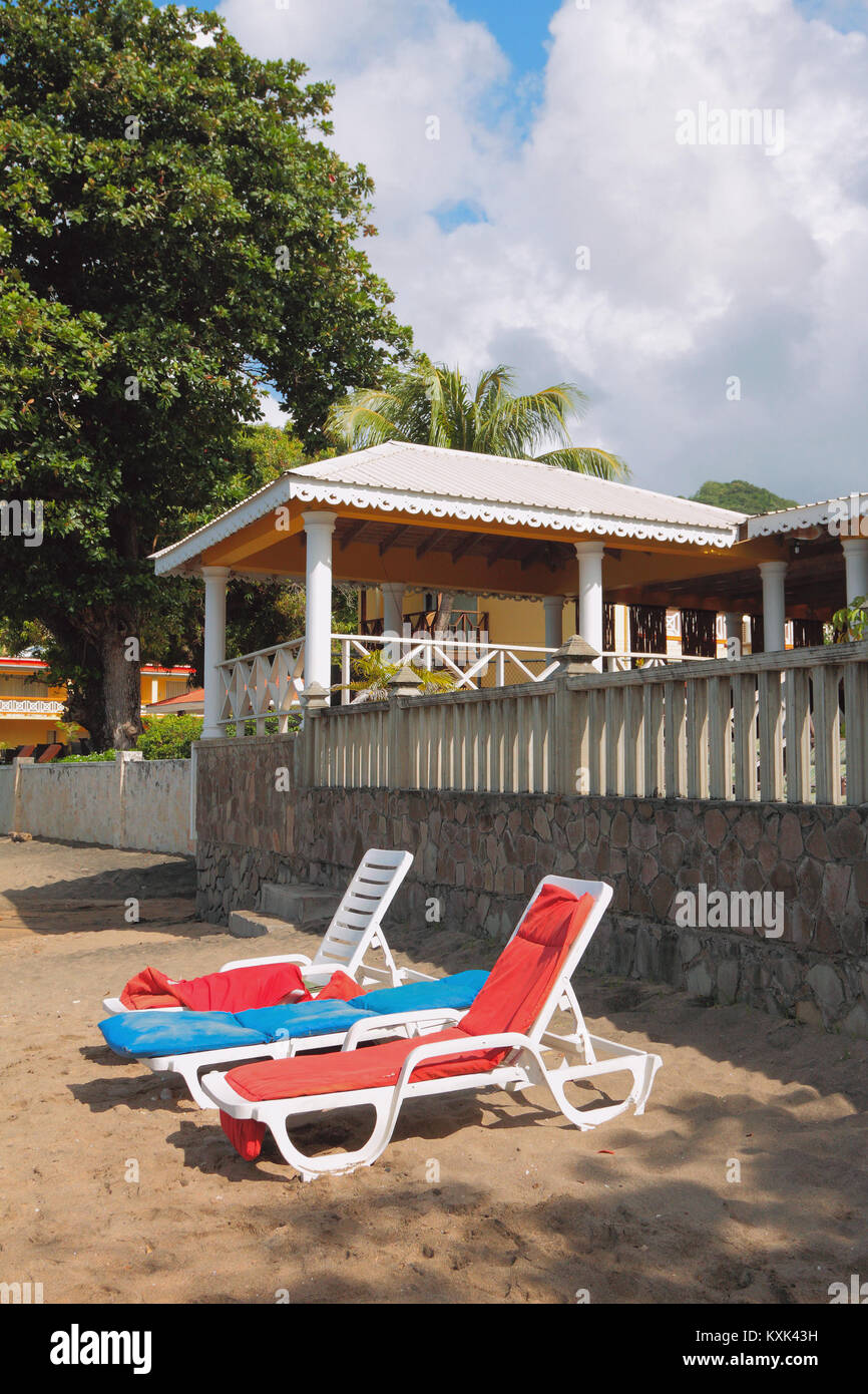 Chaise lounges on Paradise Beach. Kingstown, Saint-Vicent Stock Photo