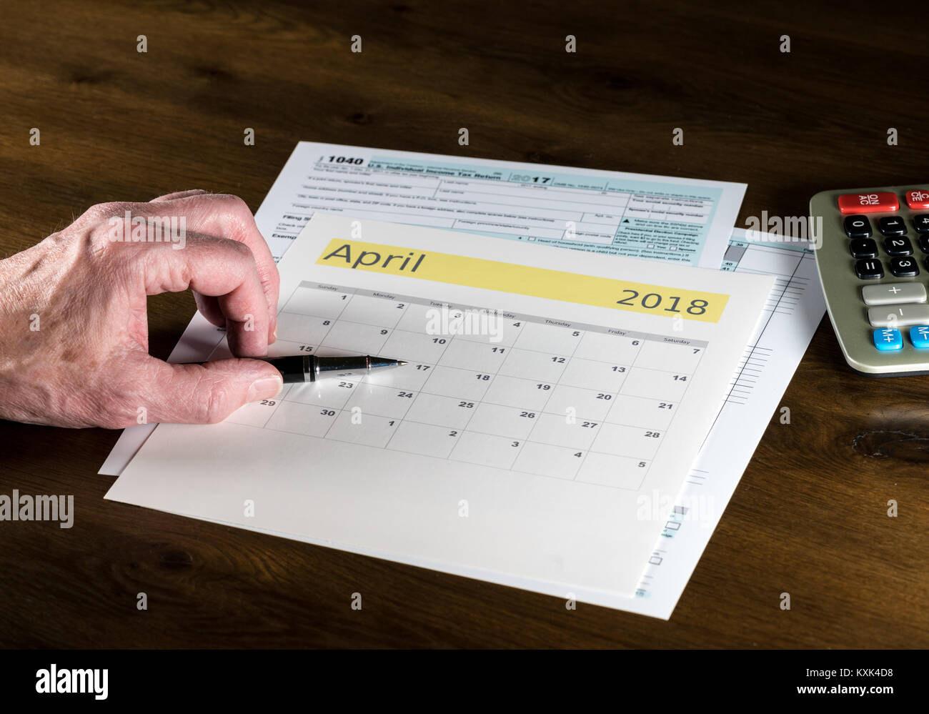 Senior adult man with tax return date of April 17, 2018 Stock Photo