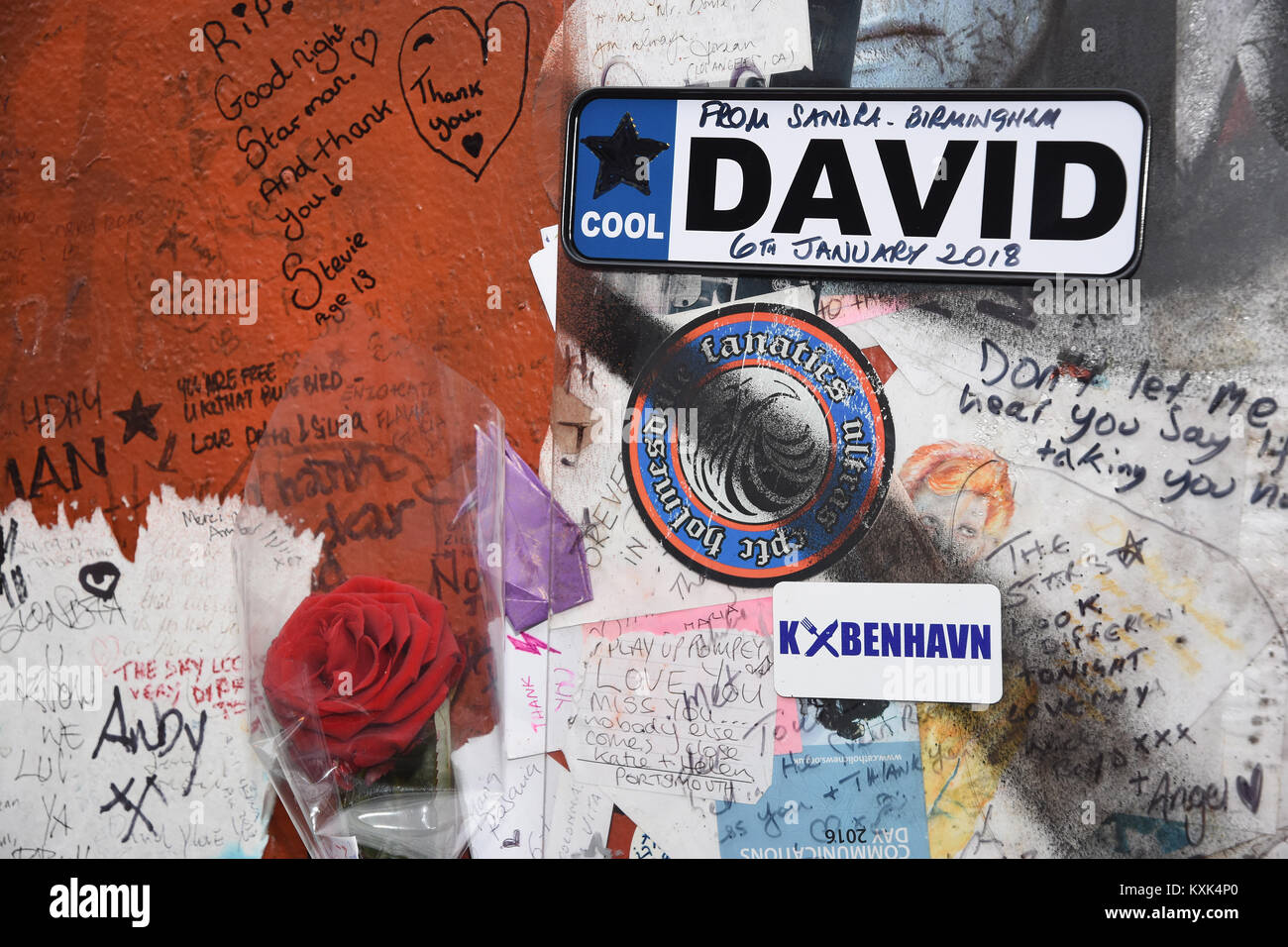 David Bowie fans left messages and floral tributes at the Aladdin Sane Mural in Brixton on the second anniversary of his death on 10.01.16,London.UK Stock Photo