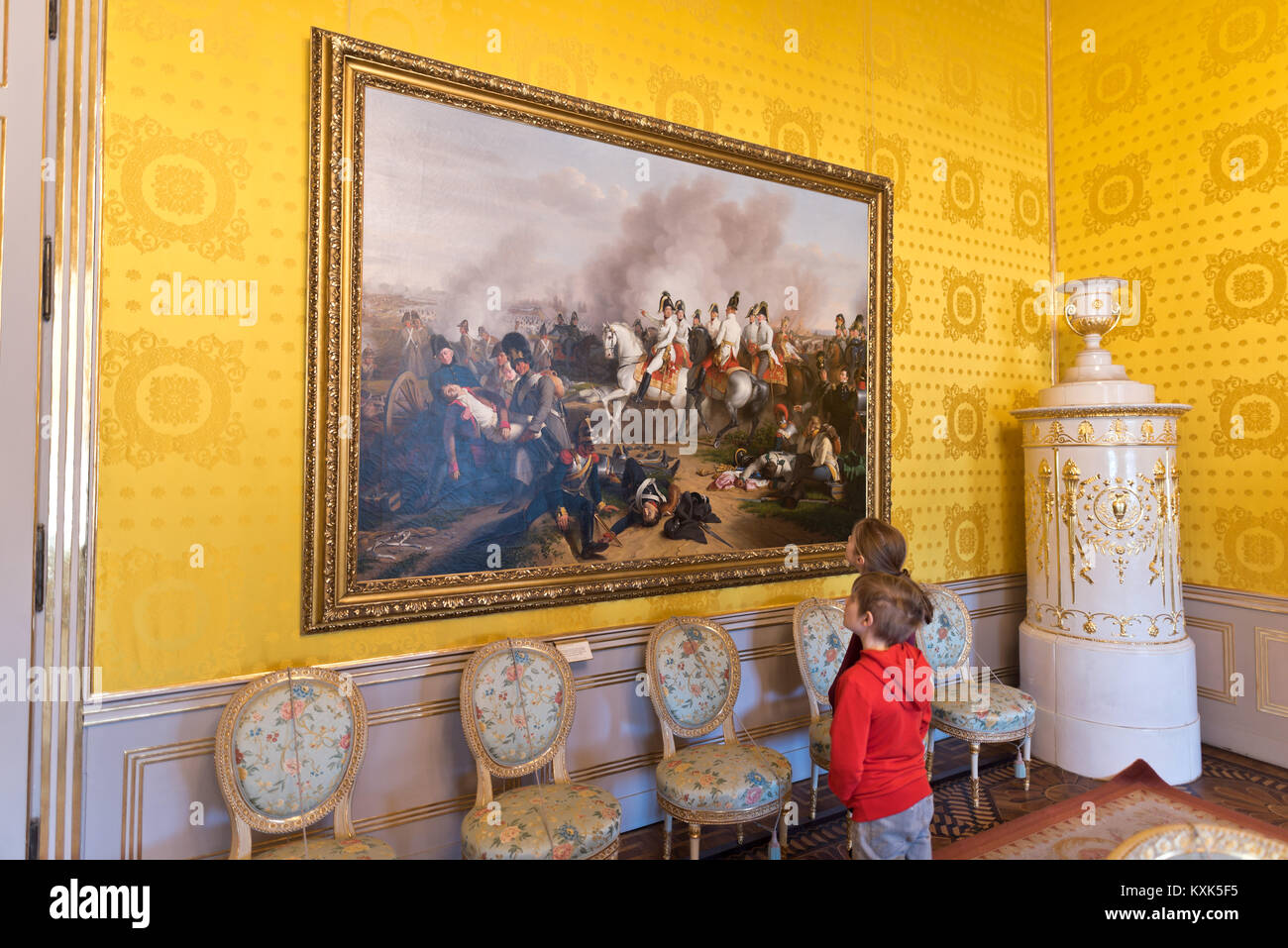 Children looking at a painting in the Reception Room of the State Rooms at the Albertina Museum in Vienna. Stock Photo