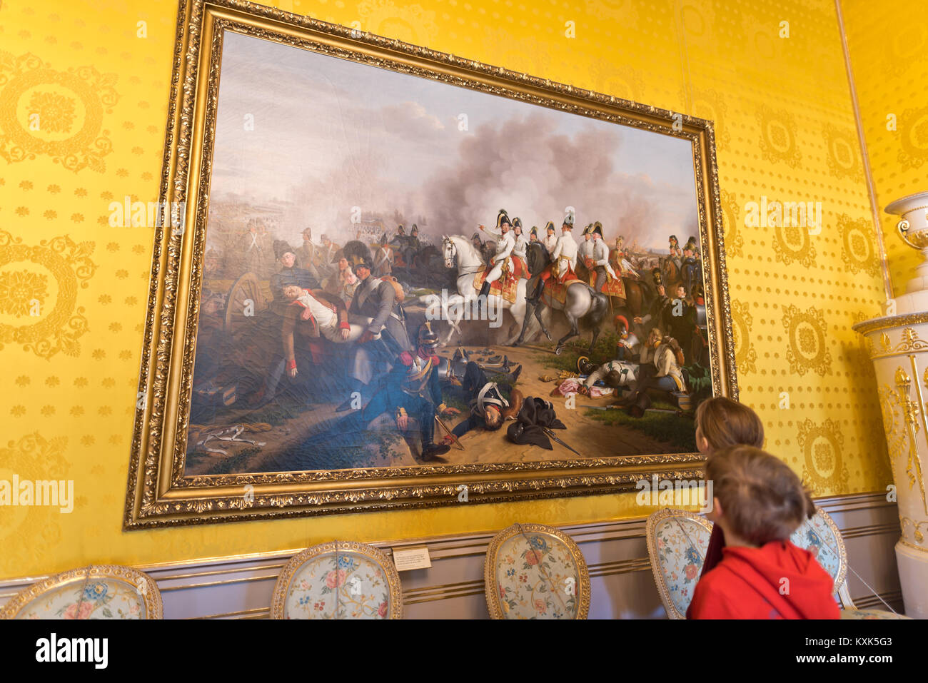 Children looking at a painting in the Reception Room of the State Rooms at the Albertina Museum in Vienna. Stock Photo