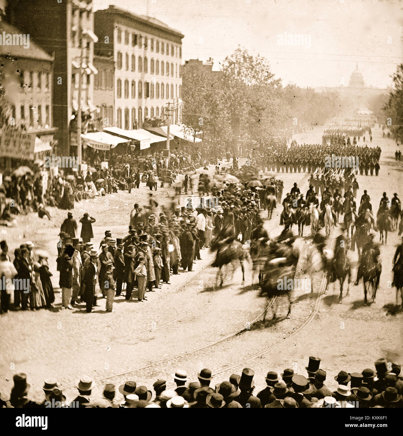 Washington, District of Columbia. The Grand Review of the Army. Gen. Henry W. Slocum (Army of Georgia) and staff passing on Pennsylvania Avenue near the Treasury Stock Photo