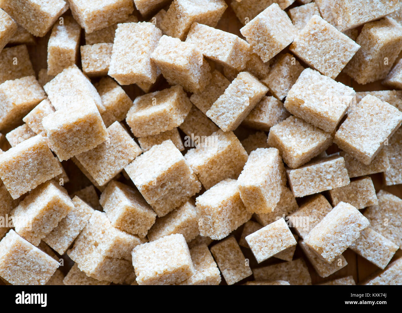 many organic brown sugar cubes in disarray Stock Photo Alamy