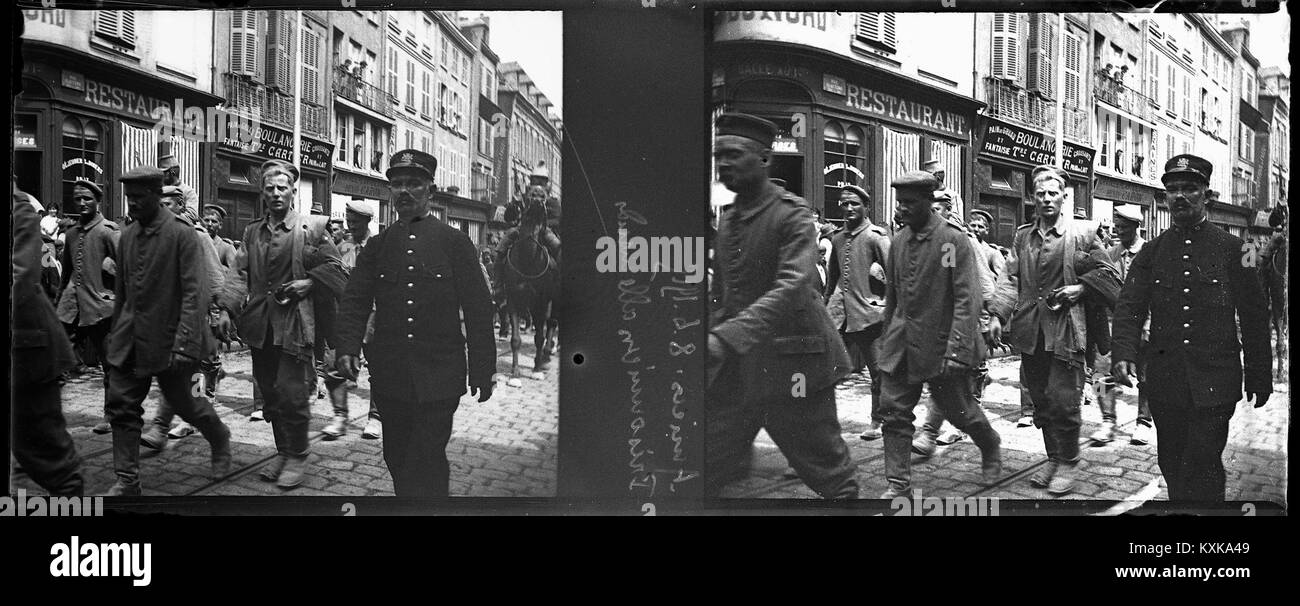 This image from June 8, 1915, shows German prisoners of war in Amiens during World War I. Captured by the French, the photograph captures a significant moment in wartime history and the experiences of prisoners. Stock Photo
