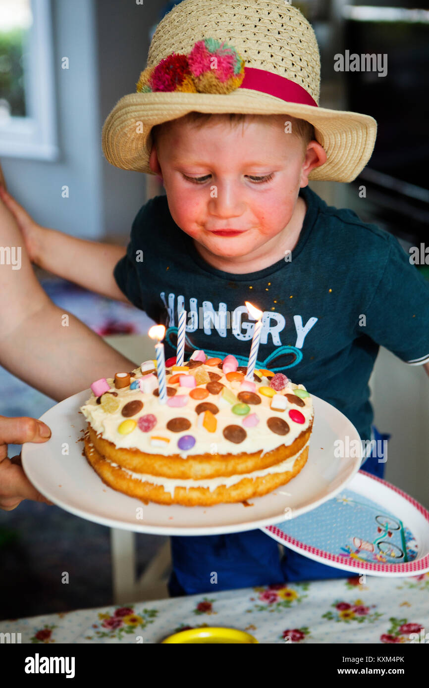Birthday party candles cake blowing hires stock photography and images