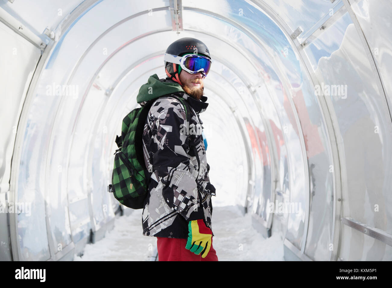 Portrait of snowboarder in ski run tunnel Stock Photo