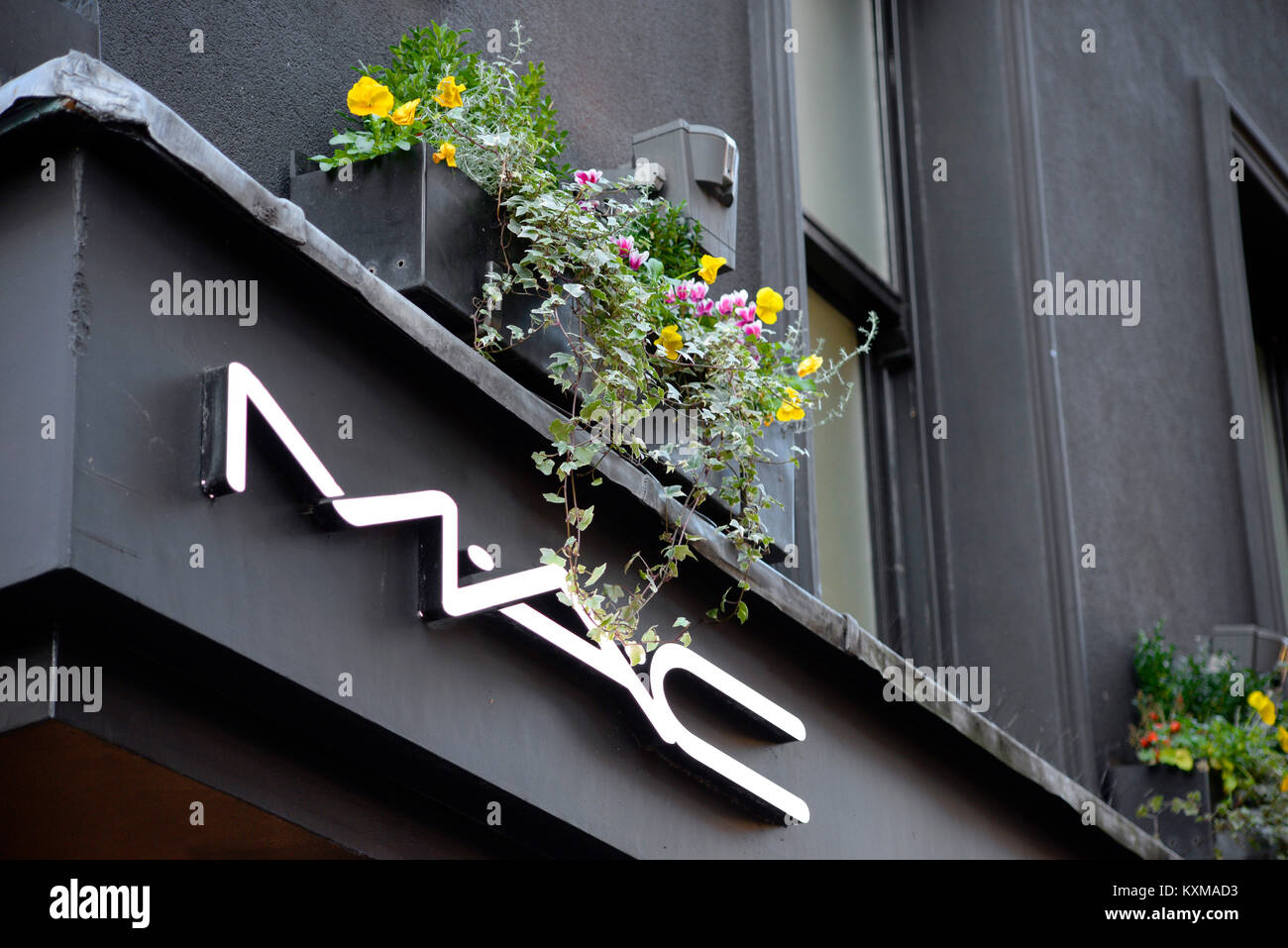 MAC cosmetics store sign, Soho, London. With flower plant box Stock Photo