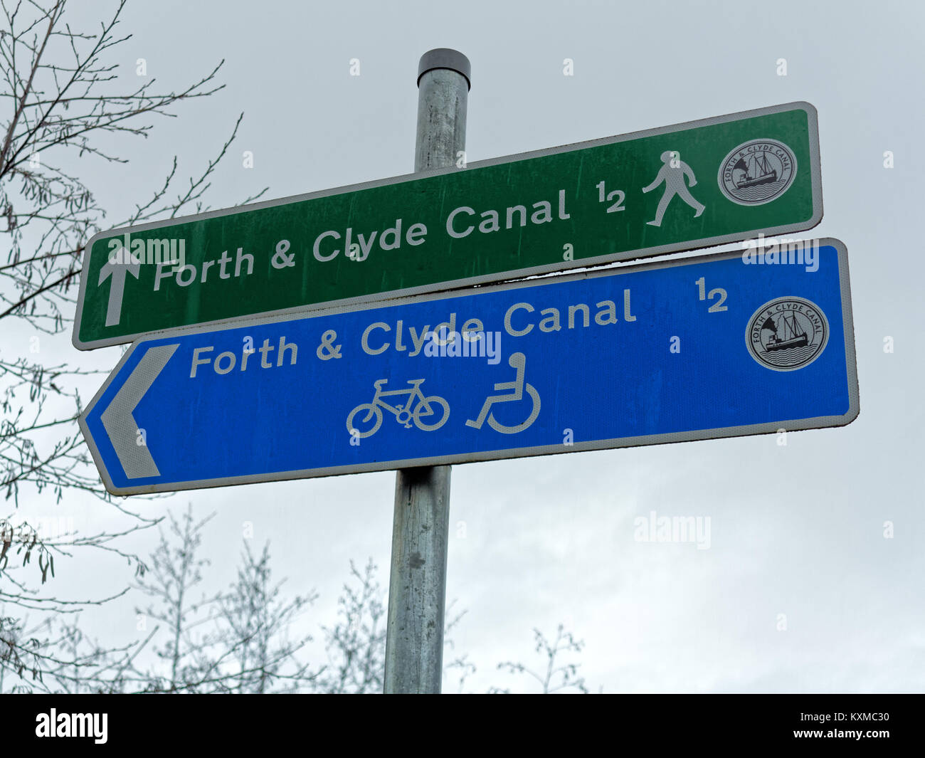 forth and clyde canal sign  blue green pointing arrow distance walking bicycle bike wheelchair disabled access Stock Photo