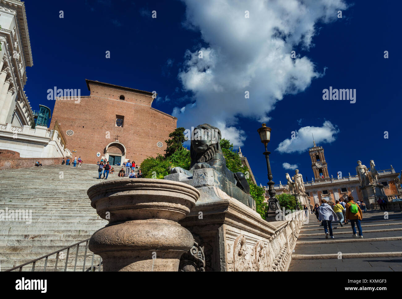 Monumental stairs leading to Capitolin Hill in the historic center of Rome with tourists Stock Photo