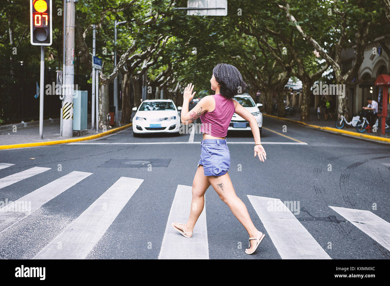 Woman power walking across hi-res stock photography and images - Alamy