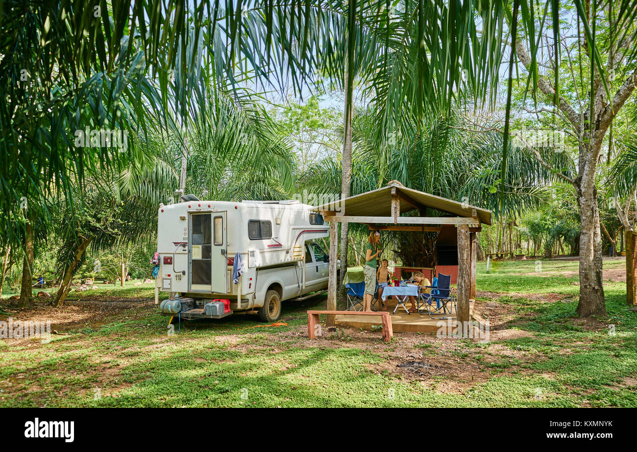 Campervan parked on campsite by picnic shelter,Bonito,Mato Grosso do Sul,Brazil,South America Stock Photo