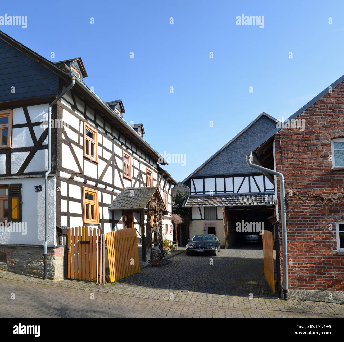 The historic barn (Scheune) at Alte Ortsstraße 39 in Bechtheim, Germany, represents traditional rural architecture and local heritage. Stock Photo