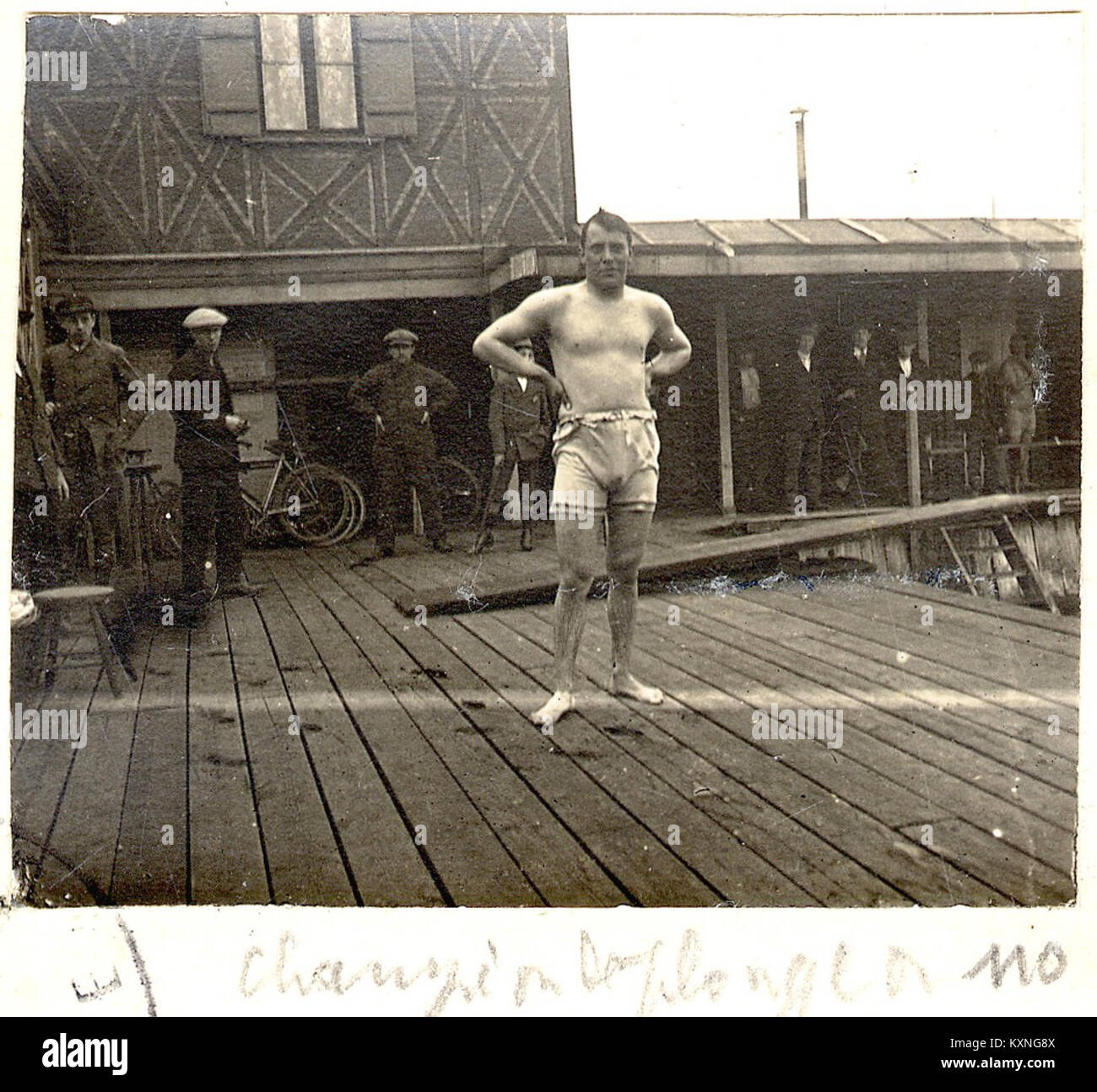 This photograph shows a diving champion captured in mid-action ...