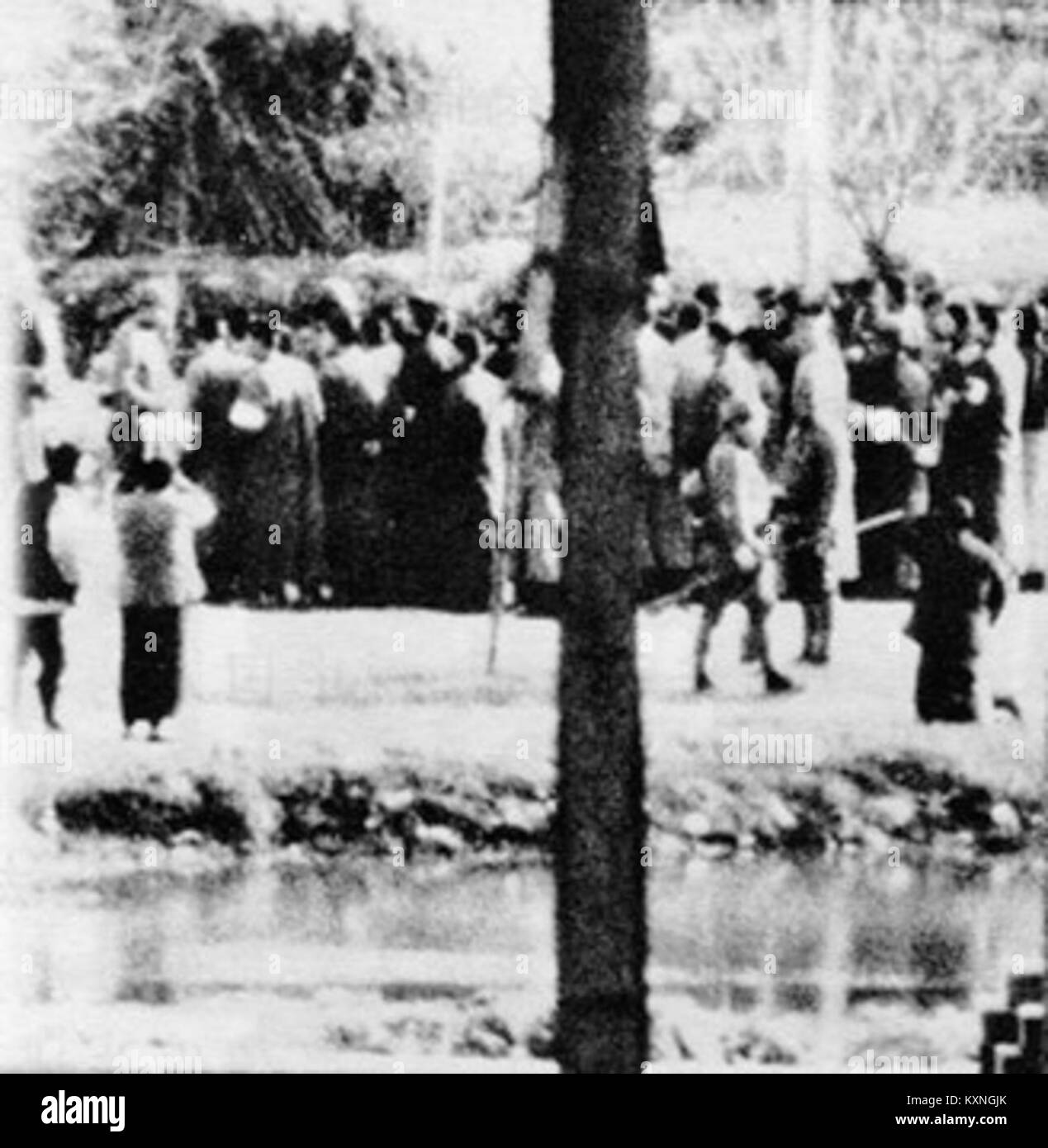 Chinese women begging Japanese soldiers for their men, Nanking Massacre Stock Photo