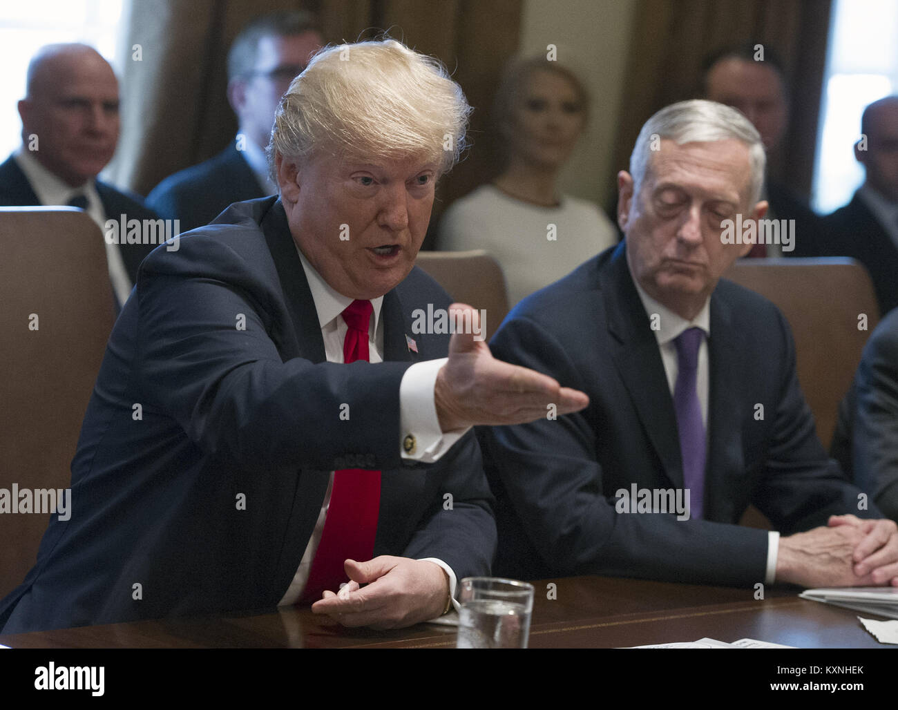 Washington, District of Columbia, USA. 10th Jan, 2018. United States President DONALD TRUMP makes opening remarks as he holds a Cabinet meeting in the Cabinet Room of the White House. Looking on from right is US Secretary of Defense Jim Mattis. Credit: Ron Sachs/CNP/ZUMA Wire/Alamy Live News Stock Photo