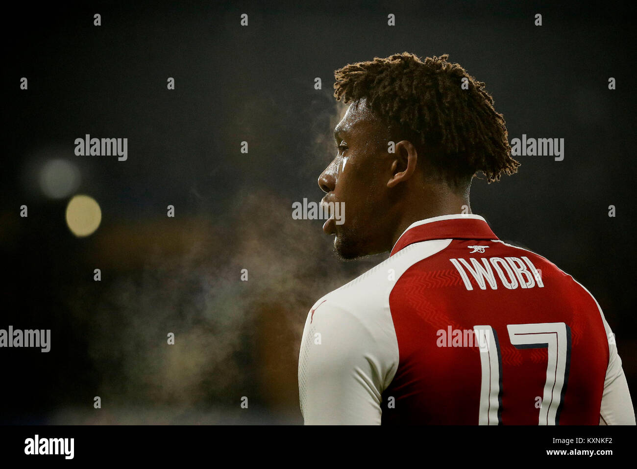 London, UK. 10th Jan, 2018. Arsenal's Alex Iwobi looks across the pitch during the English League Cup semi-final 1st leg match between Chelsea and Arsenal at Stamford Bridge Stadium in London, Britain on Jan. 10, 2018. Chelsea and Arsenal drew 0-0. Credit: Tim Ireland/Xinhua/Alamy Live News Stock Photo