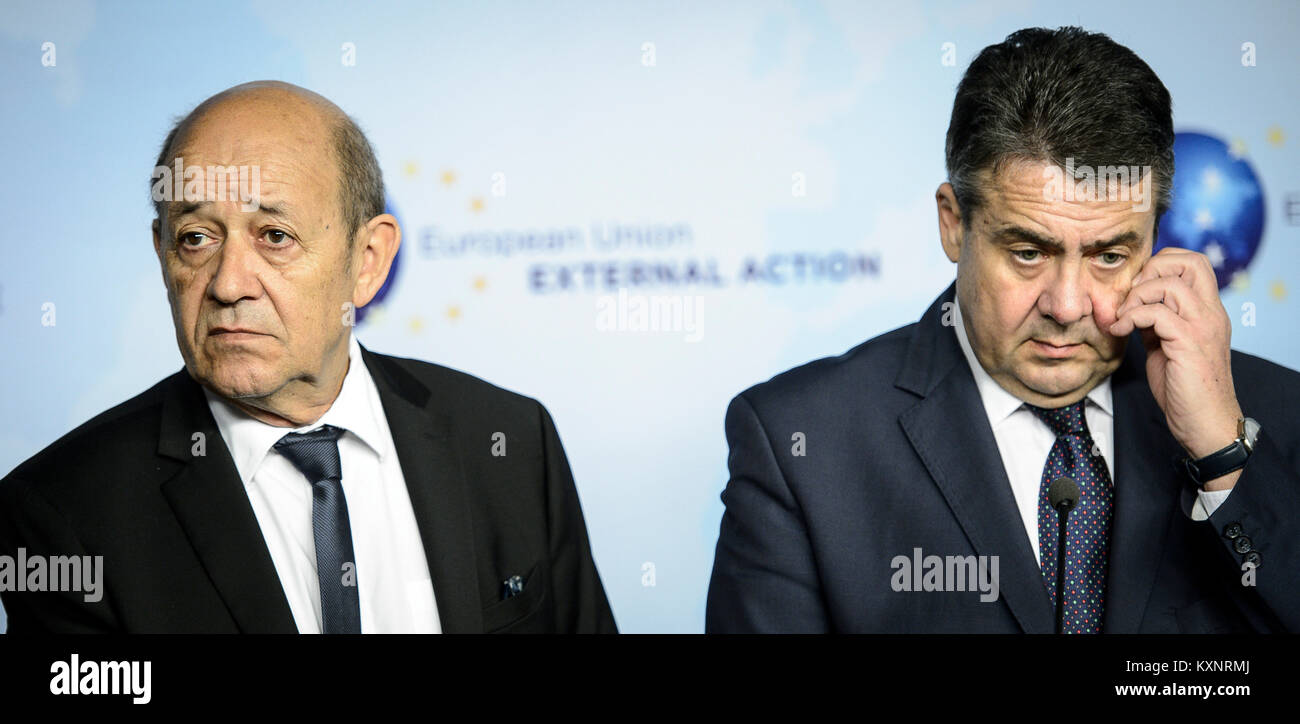 Brussels, Belgium. 11th Jan, 2018. (L-R) France Foreign Minister Jean-Yves Le Drian and Germany Foreign Minister Sigmar Gabriel give a press conference after a meeting with Iranian Foreign Minister Jawad Zarif at European External Action Service (EEAS) headquarters in Brussels, Belgium on 11.01.2018 by Wiktor Dabkowski | usage worldwide Credit: dpa/Alamy Live News Stock Photo