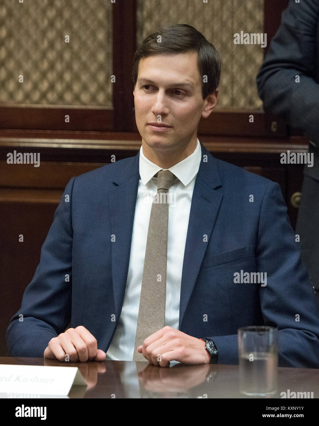 Jared Kushner, Senior Advisor to the President, listens as United States President Donald J. Trump leads a prison reform roundtable in the Roosevelt Room of the White House in Washington, DC on Thursday, January 11, 2018. Credit: Ron Sachs/CNP /MediaPunch Stock Photo