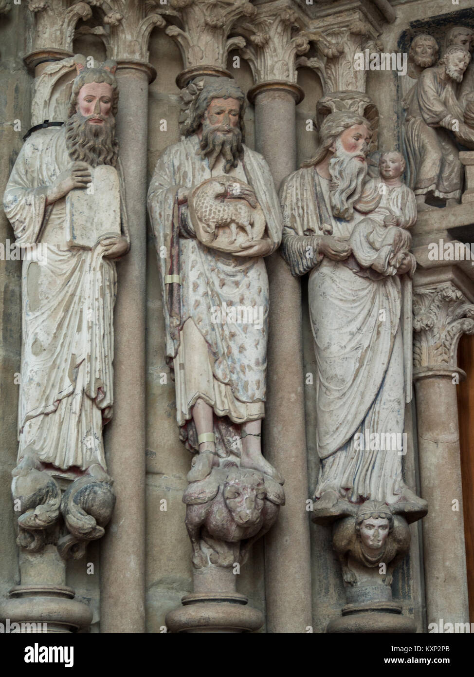 Painted statues from the south door of Lausanne Cathedral Stock Photo