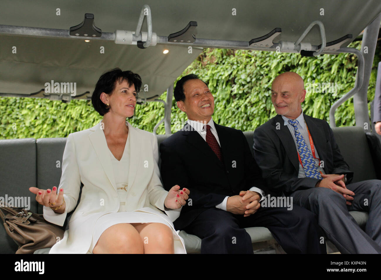 Swiss Federal President Doris Leuthard is shown with Mr. Wu and General Commissioner Dr. Uli Sigg, representing an official meeting or diplomatic event. Stock Photo