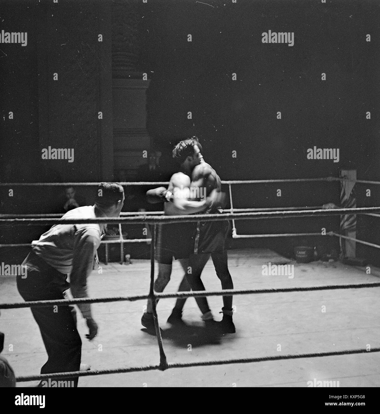 A photograph of a boxing match between Dutch and American Army teams ...