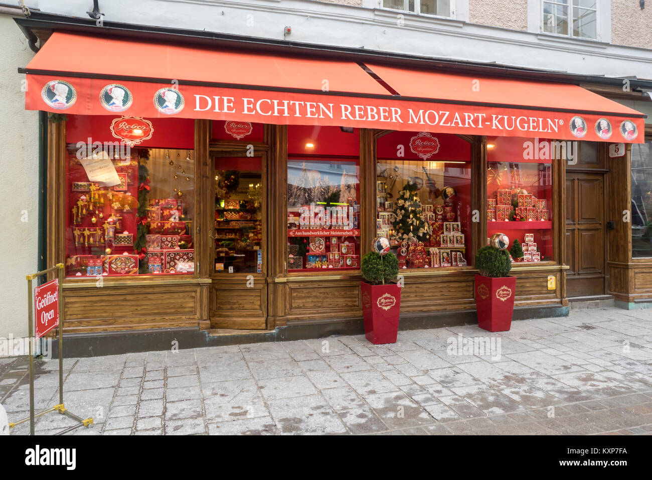 SALZBURG, AUSTRIA - DECEMBER 05, 2017:  Exterior view of Die Echten Reber Mozart-Kugeln Confectionery Shop in Alter Markt Square Stock Photo